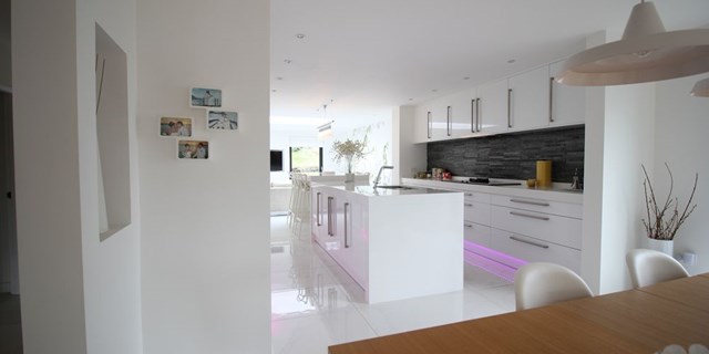 Modern kitchen detail within open plan living conversion completed by recommended Wirral builders OPB.